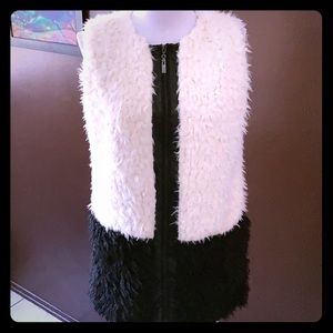 Long black and creme two tone furry vest